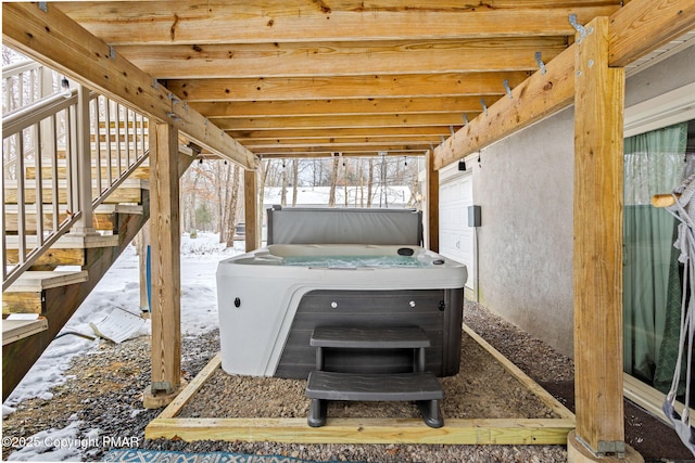 exterior space featuring a hot tub