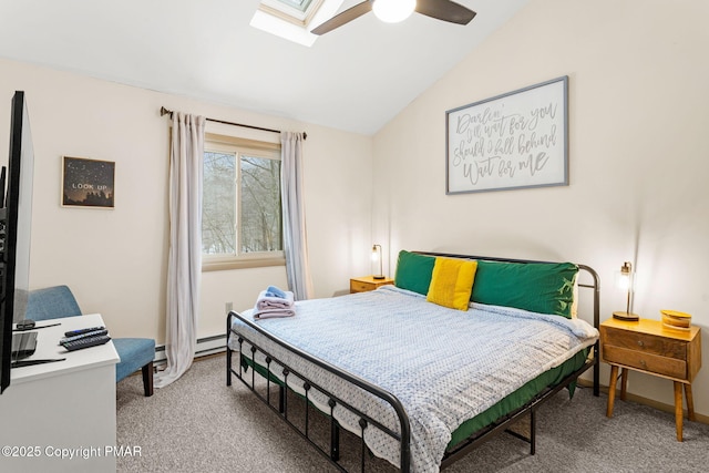 bedroom with ceiling fan, a baseboard radiator, carpet flooring, baseboards, and lofted ceiling with skylight