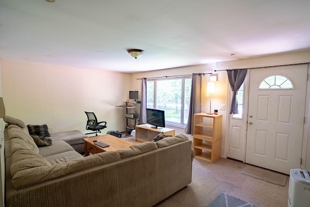1206 Wooddale Rd, East Stroudsburg, PA 18302 - carpeted living room featuring plenty of natural light