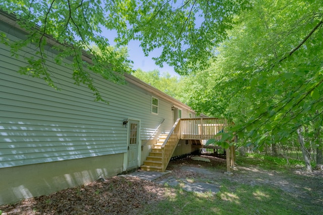 1206 Wooddale Rd, East Stroudsburg, PA 18302 - view of property exterior featuring stairway and a wooden deck