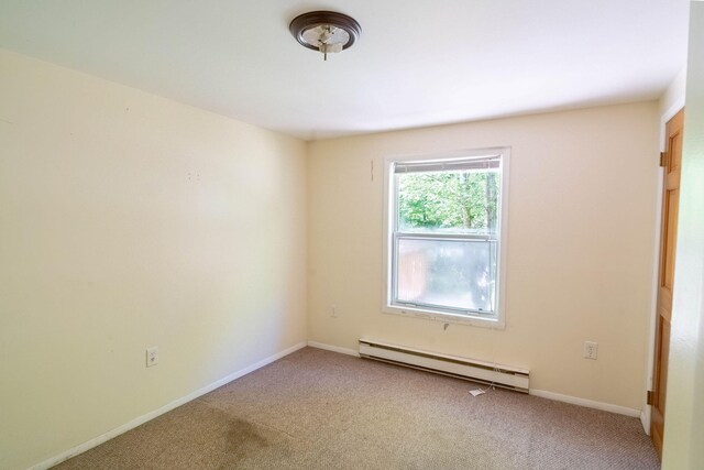 1206 Wooddale Rd, East Stroudsburg, PA 18302 - unfurnished room with a baseboard heating unit, carpet, and baseboards