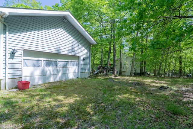 1206 Wooddale Rd, East Stroudsburg, PA 18302 - view of yard featuring a garage