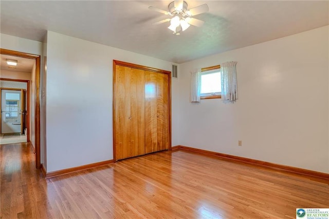 829 E Main St, Weatherly, PA 18255 - unfurnished bedroom featuring light wood-style flooring, baseboards, a closet, and ceiling fan