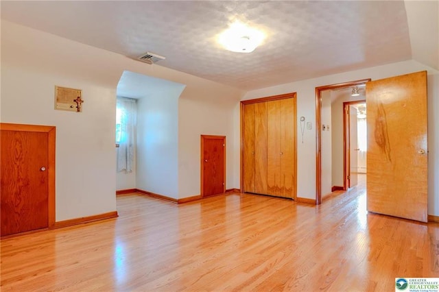 829 E Main St, Weatherly, PA 18255 - unfurnished room with healthy amount of natural light, light wood finished floors, and baseboards