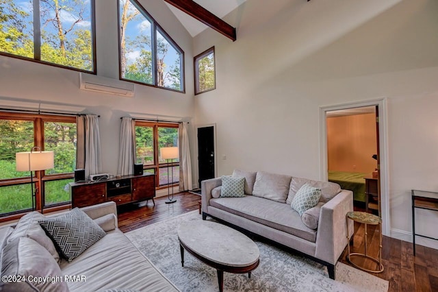 living area with beam ceiling, high vaulted ceiling, a wall mounted air conditioner, and wood finished floors