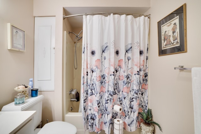 bathroom with vanity, toilet, and shower / bath combo