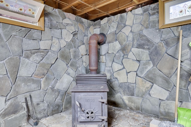 interior details featuring a wood stove