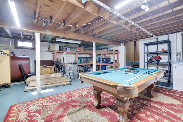 game room with pool table, washer / clothes dryer, and concrete floors