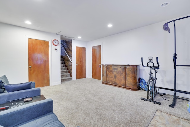 workout room featuring recessed lighting and carpet