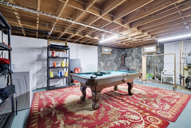 rec room with pool table and a wood stove