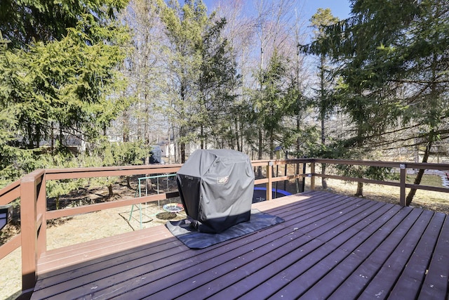 wooden terrace with grilling area