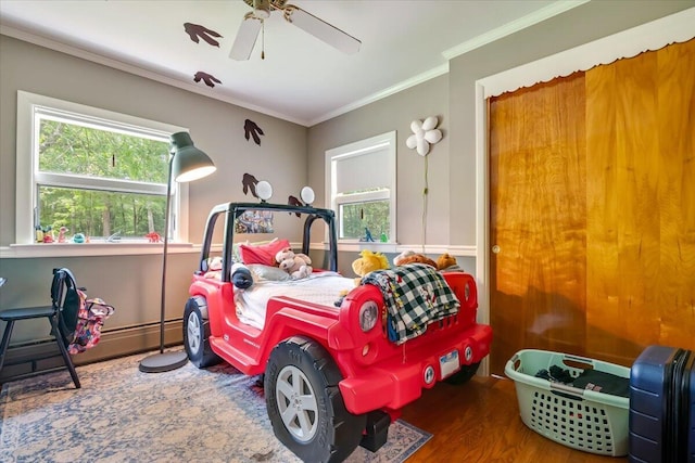 742 White Oak Rd, Cresco, PA 18326 - bedroom featuring wood finished floors, crown molding, multiple windows, and a ceiling fan