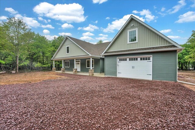 111 Parker Mews, Albrightsville, PA 18210 - craftsman inspired home with covered porch, board and batten siding, driveway, and a shingled roof