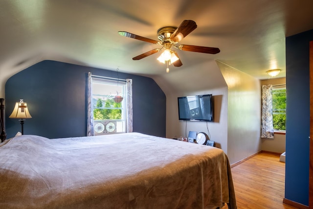 7035 Scenic Dr, Bloomsburg, PA 17815 - bedroom featuring wood finished floors, lofted ceiling, and a ceiling fan