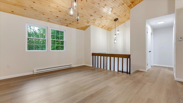 148 Acorn Ln, Kunkletown, PA 18058 - spare room featuring baseboard heating, wooden ceiling, wood finished floors, and vaulted ceiling