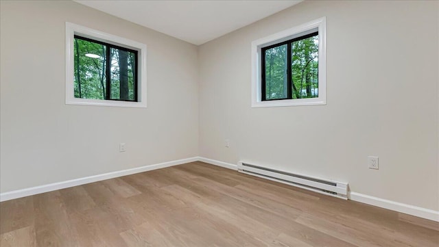 148 Acorn Ln, Kunkletown, PA 18058 - empty room with a baseboard heating unit and light wood-type flooring