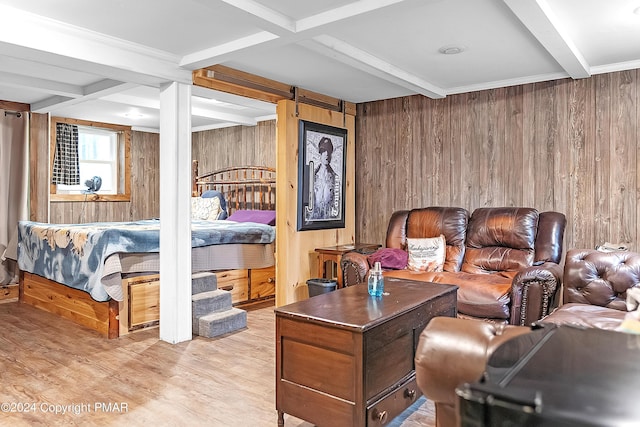 bedroom with light wood-style floors, coffered ceiling, beamed ceiling, and wood walls