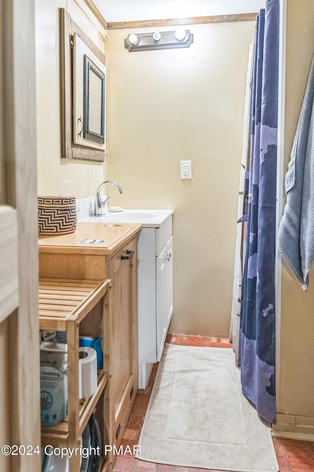 full bathroom featuring vanity, a shower with shower curtain, and tile patterned floors