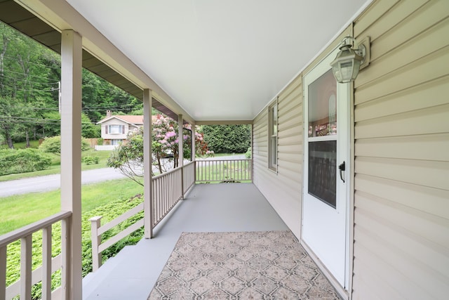157 Hollow Rd, East Stroudsburg, PA 18302 - covered porch with a lawn