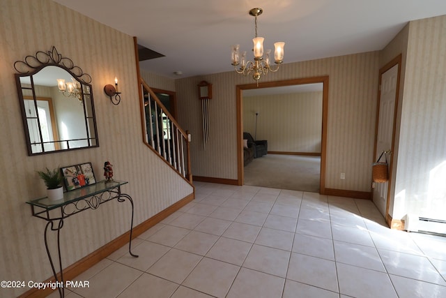 foyer with a baseboard radiator, wallpapered walls, stairway, baseboards, and tile patterned floors