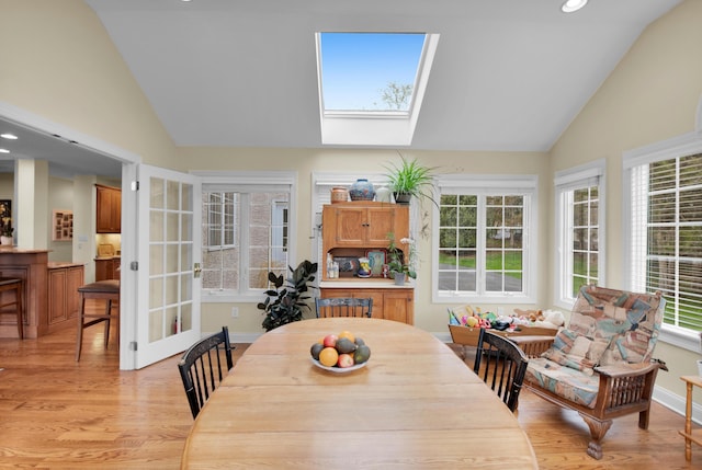 117 Morning Side Ter, East Stroudsburg, PA 18302 - dining space with baseboards, vaulted ceiling with skylight, light wood-style floors, and recessed lighting