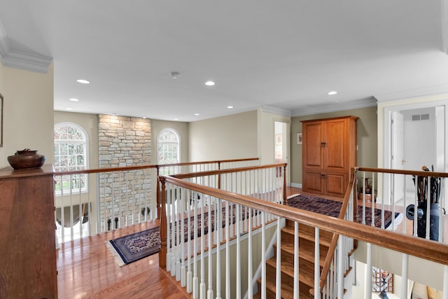 117 Morning Side Ter, East Stroudsburg, PA 18302 - hallway featuring wood finished floors, an upstairs landing, ornamental molding, visible vents, and recessed lighting