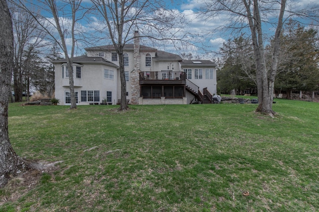 117 Morning Side Ter, East Stroudsburg, PA 18302 - back of house with stone siding, a deck, a yard, stucco siding, and stairs