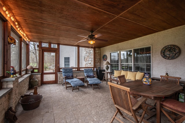 117 Morning Side Ter, East Stroudsburg, PA 18302 - sunroom with stone tile floors, outdoor dining space, wooden ceiling, and ceiling fan
