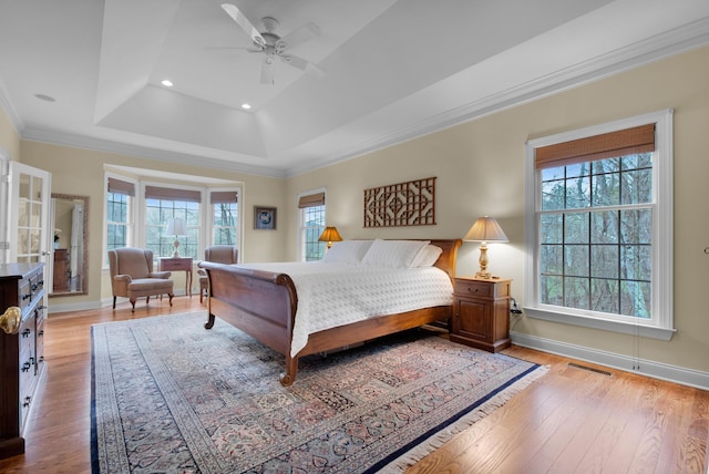 117 Morning Side Ter, East Stroudsburg, PA 18302 - bedroom featuring light wood-type flooring, visible vents, a raised ceiling, and crown molding