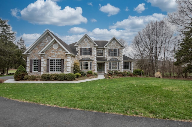 117 Morning Side Ter, East Stroudsburg, PA 18302 - view of front facade with stone siding and a front lawn