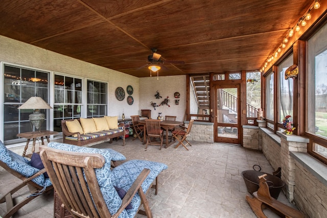 117 Morning Side Ter, East Stroudsburg, PA 18302 - sunroom / solarium with outdoor dining space, ceiling fan, stone tile flooring, an outdoor living space, and wooden ceiling