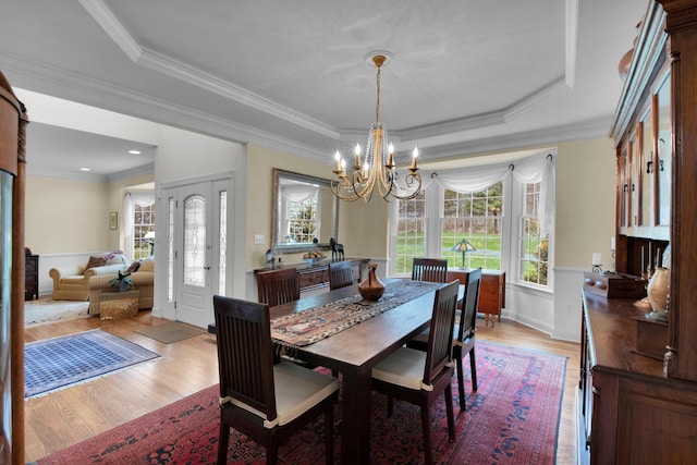 117 Morning Side Ter, East Stroudsburg, PA 18302 - dining space with crown molding, a notable chandelier, a tray ceiling, and light wood finished floors