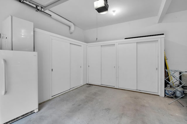 117 Morning Side Ter, East Stroudsburg, PA 18302 - garage with freestanding refrigerator and a garage door opener