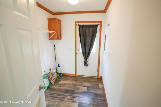 laundry room featuring visible vents, baseboards, dark wood-type flooring, and ornamental molding