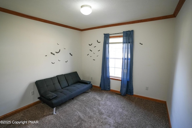 living area with baseboards, carpet floors, and crown molding