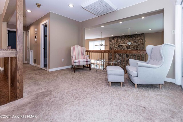 sitting room featuring recessed lighting, baseboards, carpet floors, and a ceiling fan