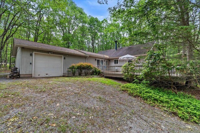1371 Brian Ln, Effort, PA 18330 - view of front of home with an attached garage and a deck