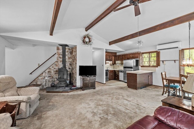 1371 Brian Ln, Effort, PA 18330 - living room featuring a wall mounted AC, light carpet, a ceiling fan, and a wood stove