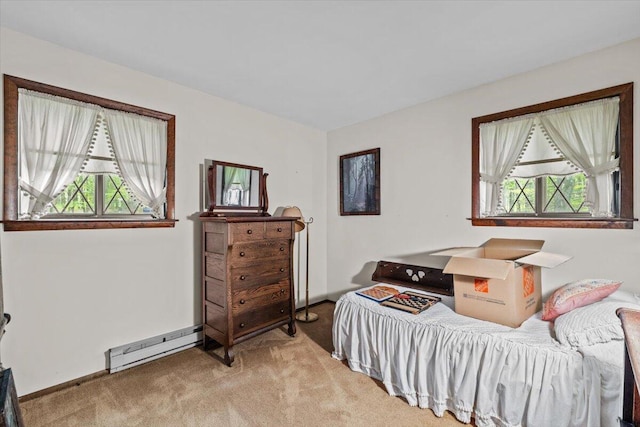 1371 Brian Ln, Effort, PA 18330 - carpeted bedroom featuring a baseboard heating unit and baseboards