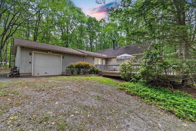 1371 Brian Ln, Effort, PA 18330 - view of front of home with a garage and a wooden deck