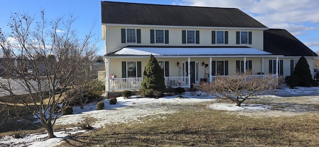 colonial inspired home with covered porch