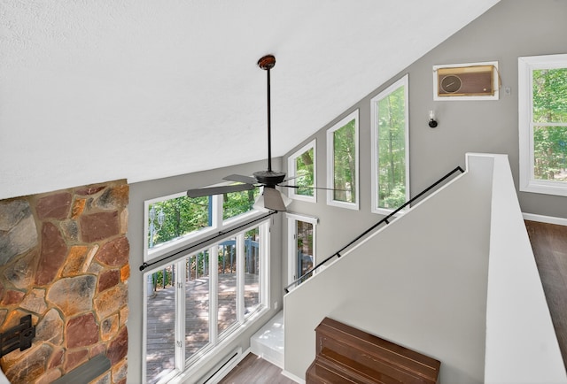 6471 Decker Rd, Bushkill, PA 18324 - stairs featuring a ceiling fan, wood finished floors, and lofted ceiling