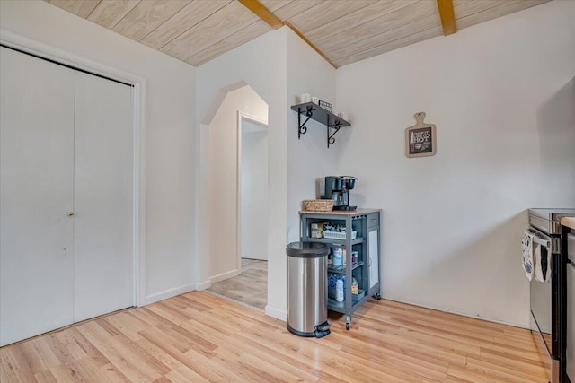 kitchen with wooden ceiling, wood finished floors, and stainless steel electric range