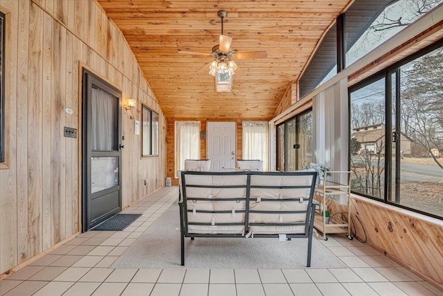 unfurnished sunroom with a wealth of natural light, wood ceiling, and vaulted ceiling