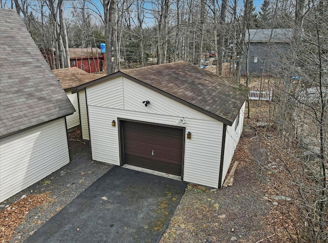 garage featuring driveway