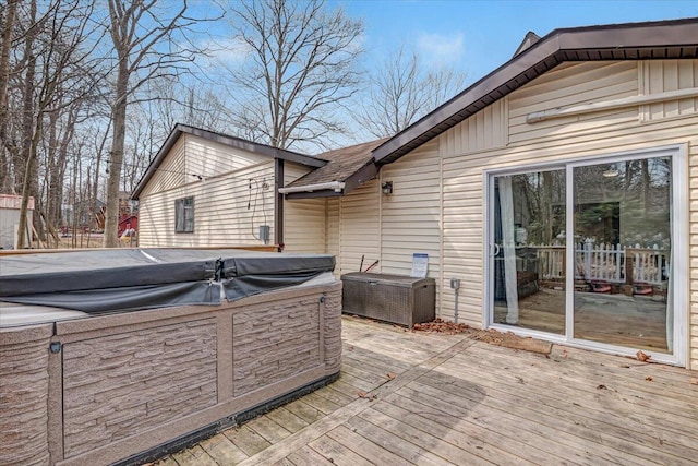 deck with a hot tub