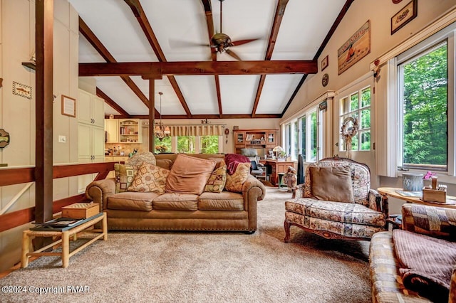 living room with lofted ceiling with beams, light colored carpet, and ceiling fan