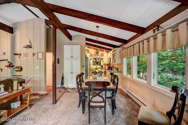 carpeted dining area featuring vaulted ceiling with beams, a chandelier, and baseboard heating