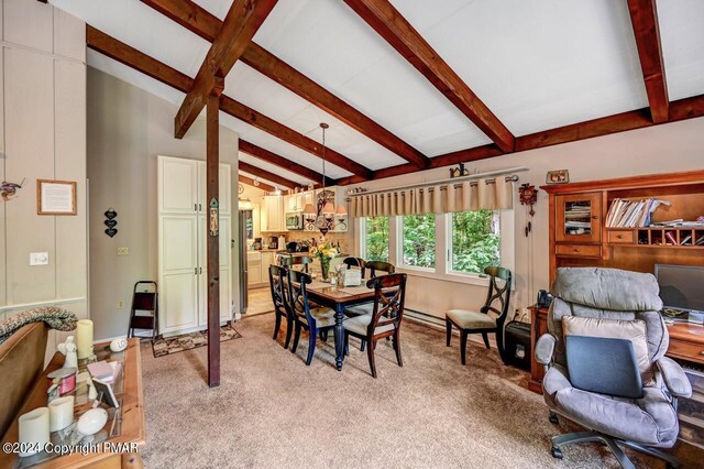 dining space featuring light carpet and vaulted ceiling with beams