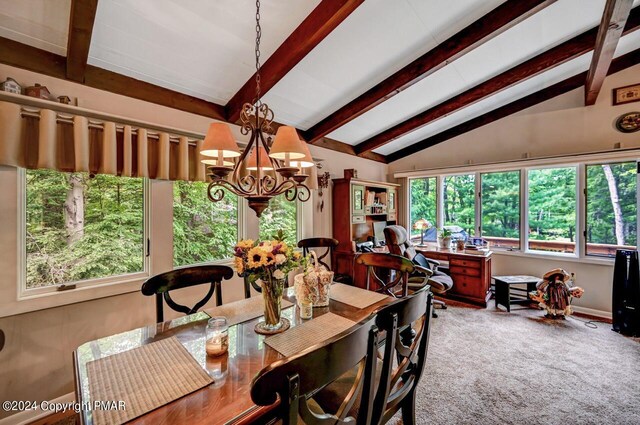 carpeted dining area with a notable chandelier and vaulted ceiling with beams